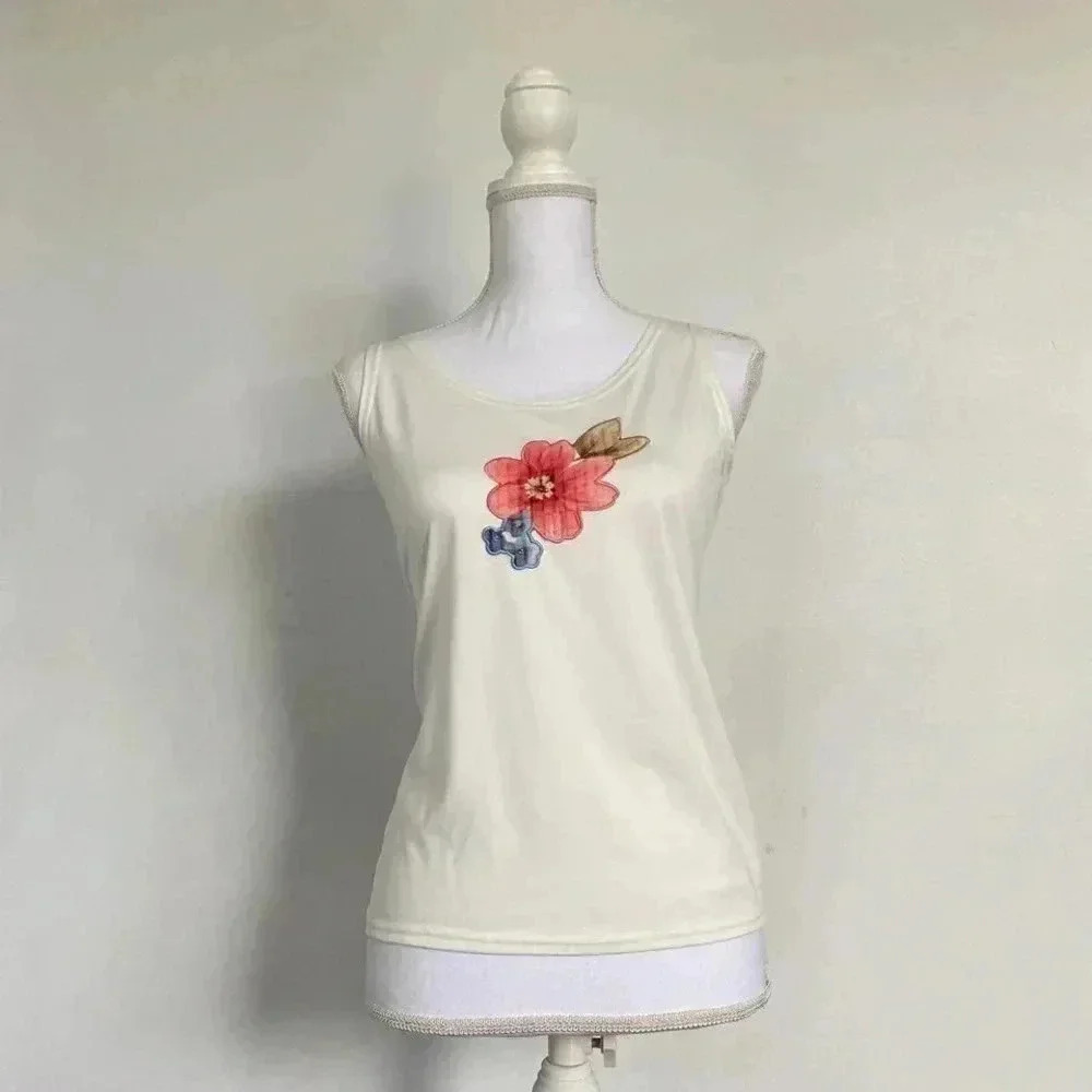 White embroidered patch flower tank top.